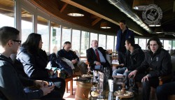 Students listen as Montevibiano CEO Lorenzo Bologna explains the winery's marketing plan on Friday's field trip.